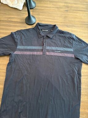 Travis Mathew Men's Black Polo with Blue and Maroon Stripes